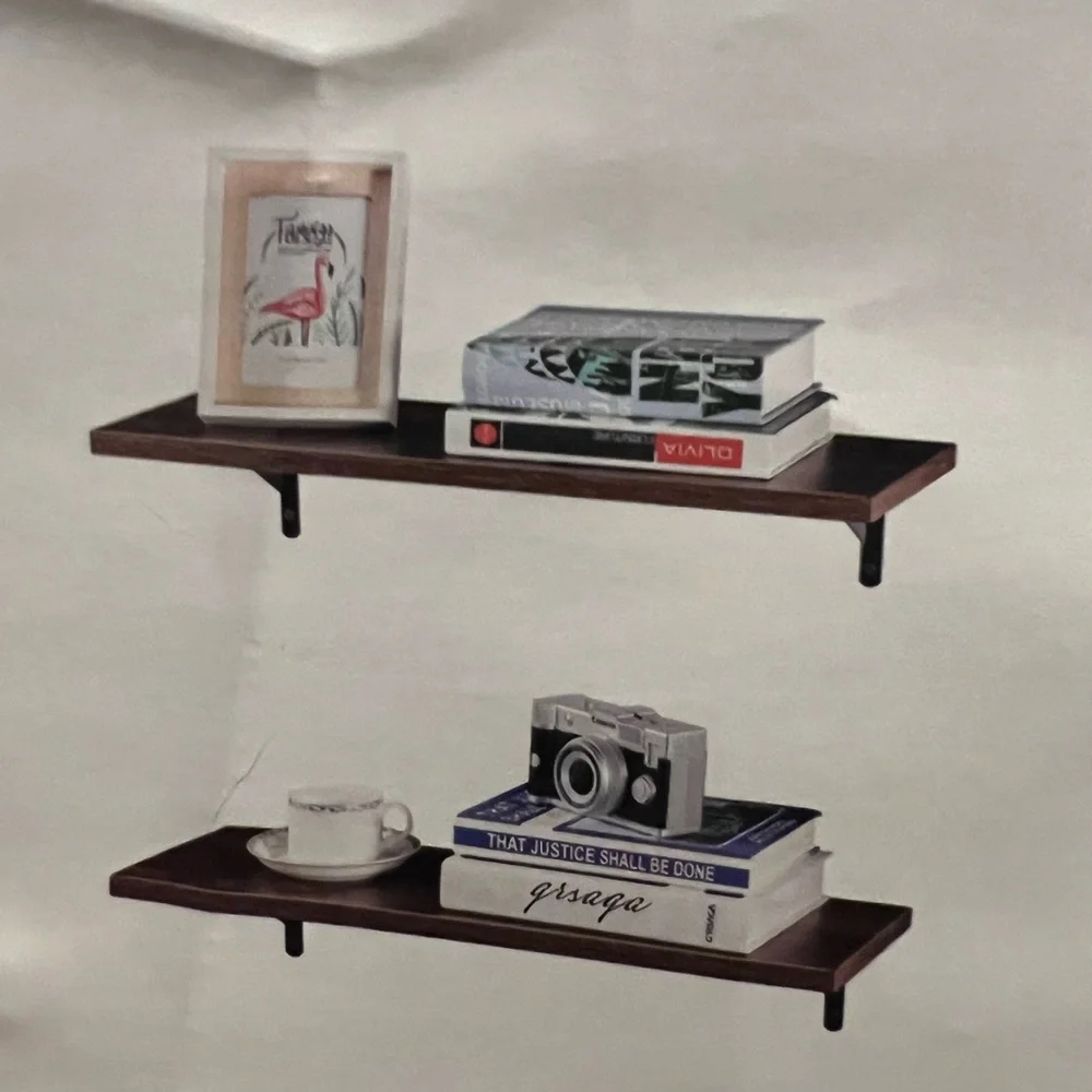 Black wall shelf with brackets